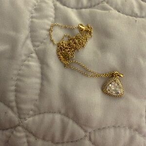 BP gold triangle necklace